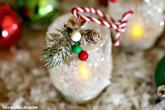 This easy DIY Snowy Lantern Ornament will shine brightly on your Christmas tree.