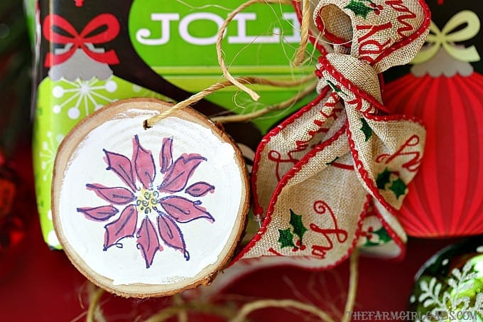 Create these Wood Slice Ornament Gift Tags to adorn your gifts with and hang on the Christmas tree.