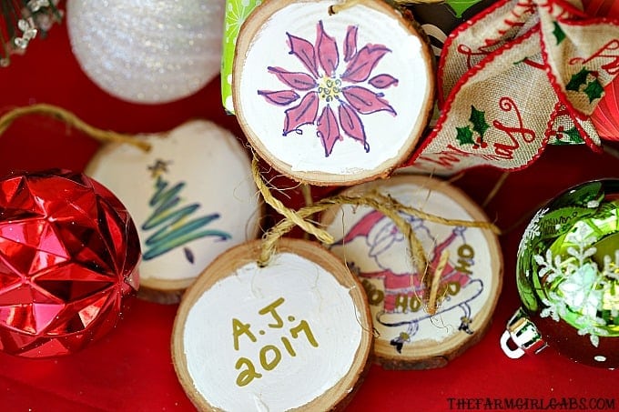 Create these Wood Slice Ornament Gift Tags to adorn your gifts with and hang on the Christmas tree.