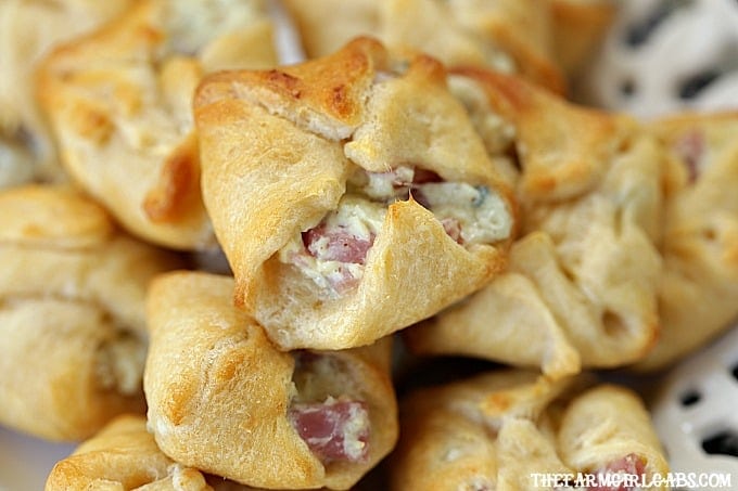 Soft and buttery crescent rolls are filled with Ham And Gorgonzola to create a delicious appetizer. These Ham And Gorgonzola Bites are perfect for any party!