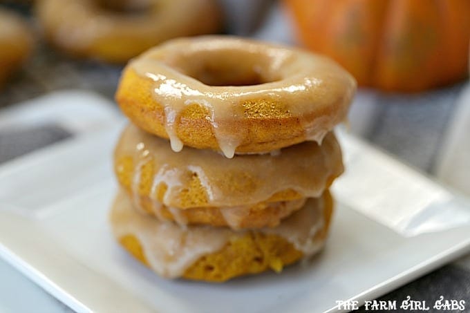 These moist and fluffy Maple Glazed Pumpkin Doughnuts are baked, not fried and are really easy to make.