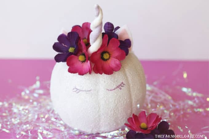 Make Halloween Magical! Make your own Sparkly Glitter Unicorn Pumpkin. This glitter-filled Halloween craft is so simple to create.