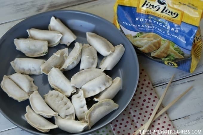 Celebrate the Chinese New Year with this easy make at home Potsticker Stir Fry Rice Bowl. Ling Ling Potstickers are so delicious. (AD) #LingLingAsian #LL #Stirfry #ChineseFood #Potstickers #ChineseNewYear