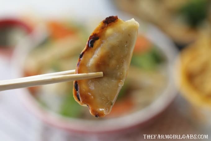 Celebrate the Chinese New Year with this easy make at home Potsticker Stir Fry Rice Bowl. Ling Ling Potstickers are so delicious. (AD) #LingLingAsian #LL #Stirfry #ChineseFood #Potstickers #ChineseNewYear