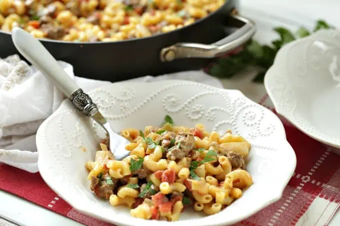 This one-pot Cheeseburger Skillet Casserole is just like that cheeseburger macaroni we all loved as kids, but only better because it is homemade. It's an easy and delicious budget-friendly dinner idea.