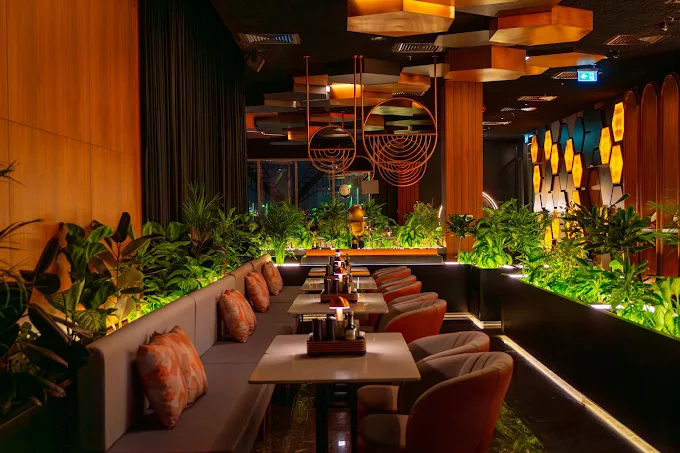 Luxury waterfront shisha lounge at HuQQabaz in Abu Dhabi.