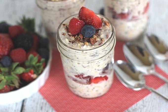 Oatmeal in a jar? Sign me up! Wake up in the morning to a delicious and healthy Berry Overnight Oatmeal. This overnight oats recipe is satisfying, delicious and filled with fresh berries. Try this easy mason jar recipe for breakfast.