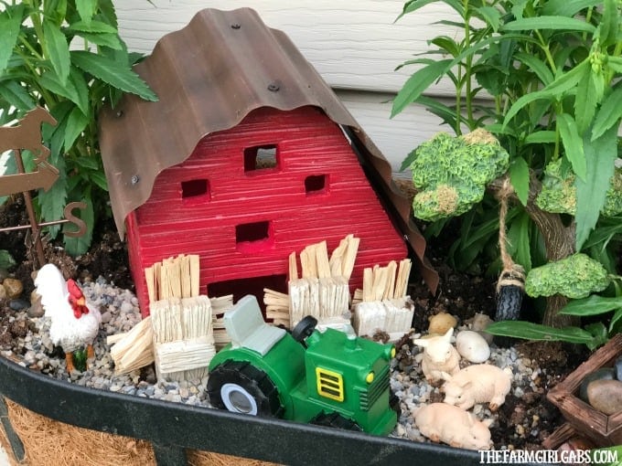 Brighten up your gardening landscape with this DIY Miniature Farm Window Box Planter idea.