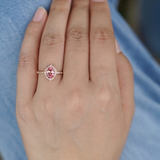 Client photo of Oval Floral Vintage Peach Sapphire Ring - Harmony