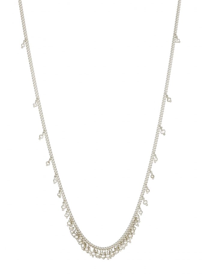 Photo of pearl and oxidised silver necklace on white background