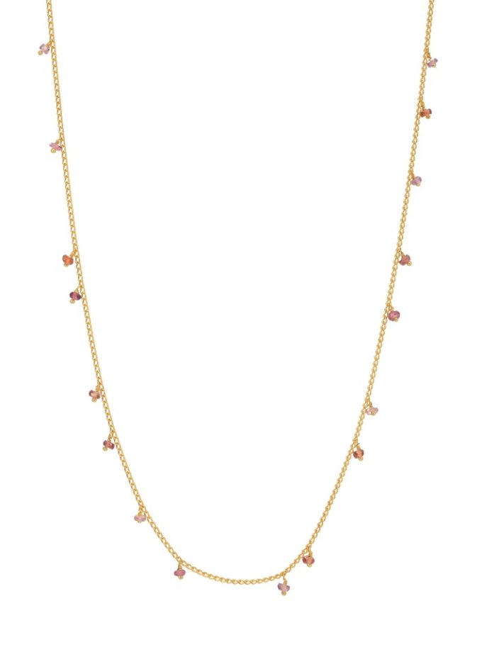 Photo of necklace with orange and peach sapphires and pink tourmalines on white background