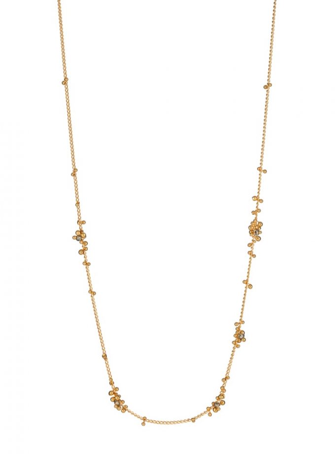 A gold plated silver chain necklace with little balls and diamond beads