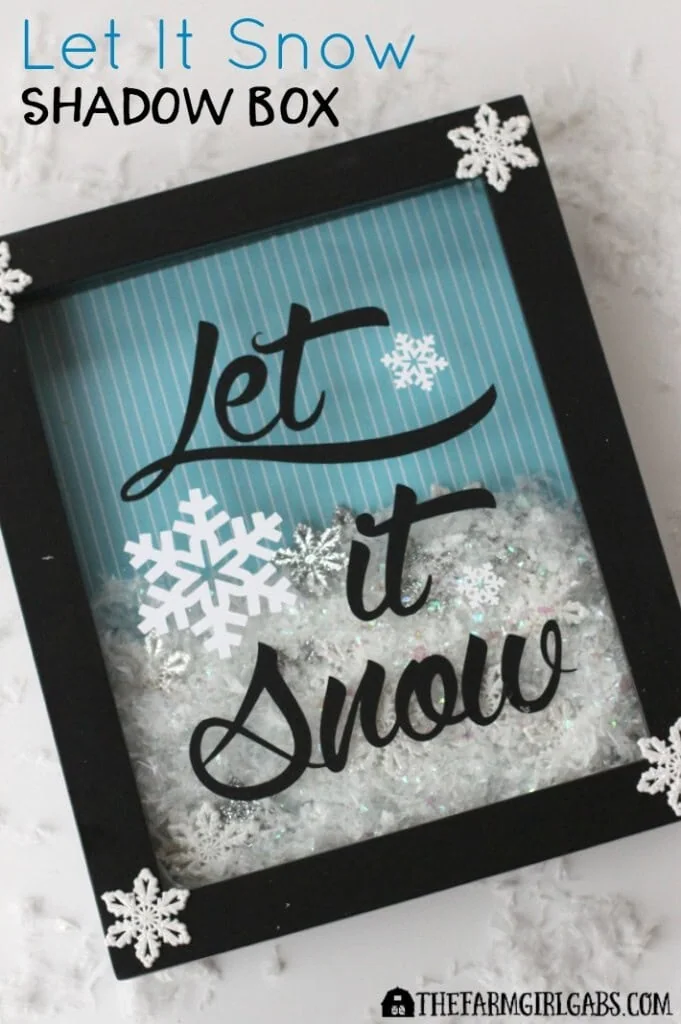 While the weather outside may be frightful, this Let It Snow Shadow Box craft is really delightful.