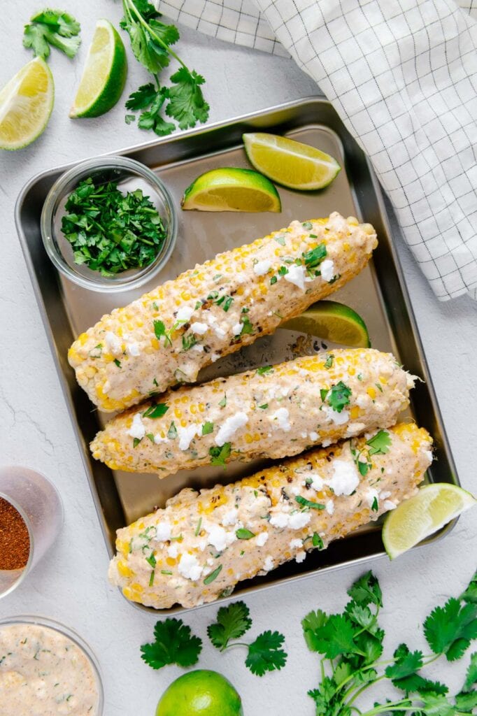 Grilling corn on the cob, Mexican street corn with all of the fixings.