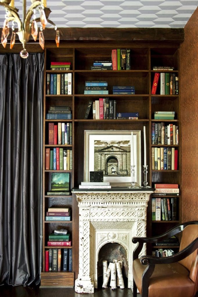 fireplace decorating ideas 57 Easy Fireplace Decorating Ideas That’ll Look Stylish All Year Long shon parker library bookshelf 682x1024