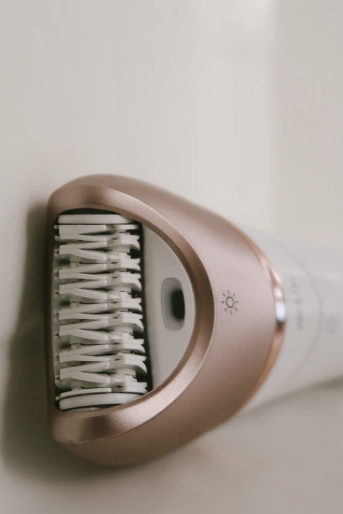Epilating vs shaving | Epilating by popular LA beauty blog, Teacups and Tulips: image of a Philips epilator.