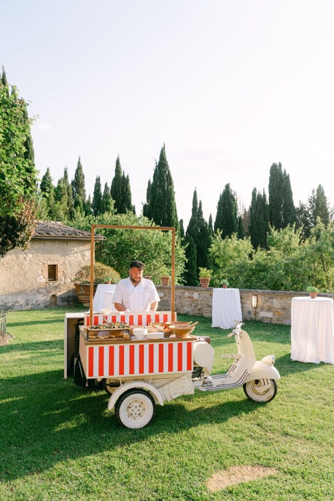 Outdoor wedding welcome party with Italian-inspired décor