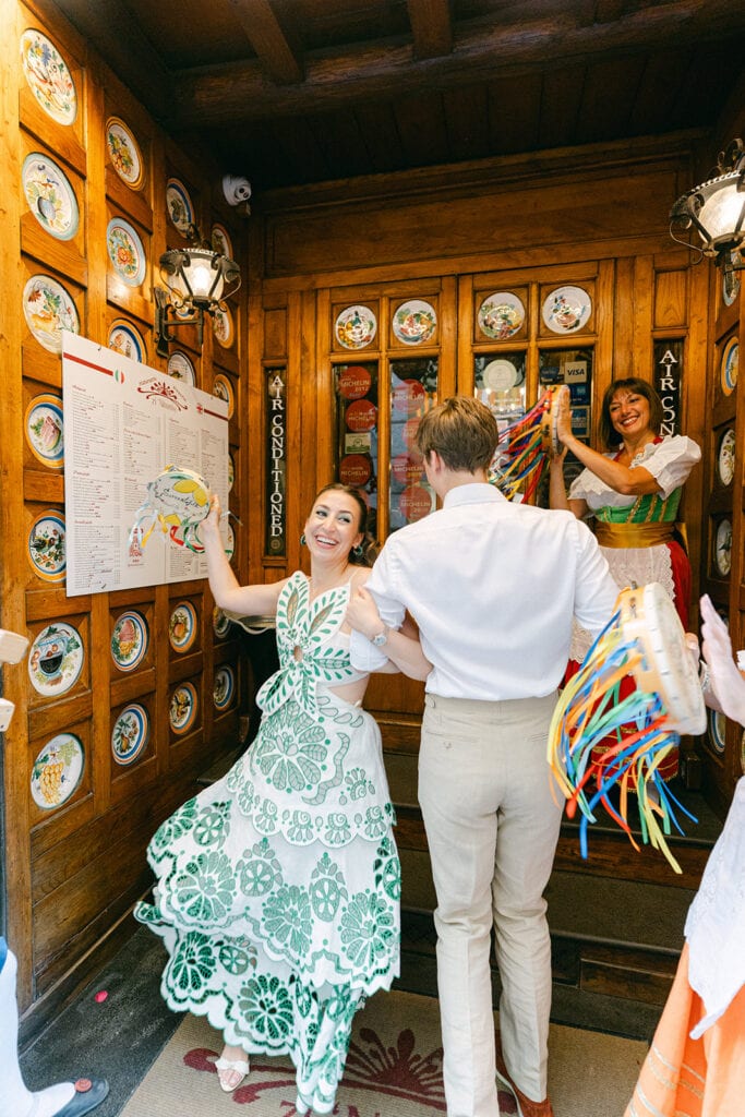 Bride and groom enjoying their Italy wedding welcome party