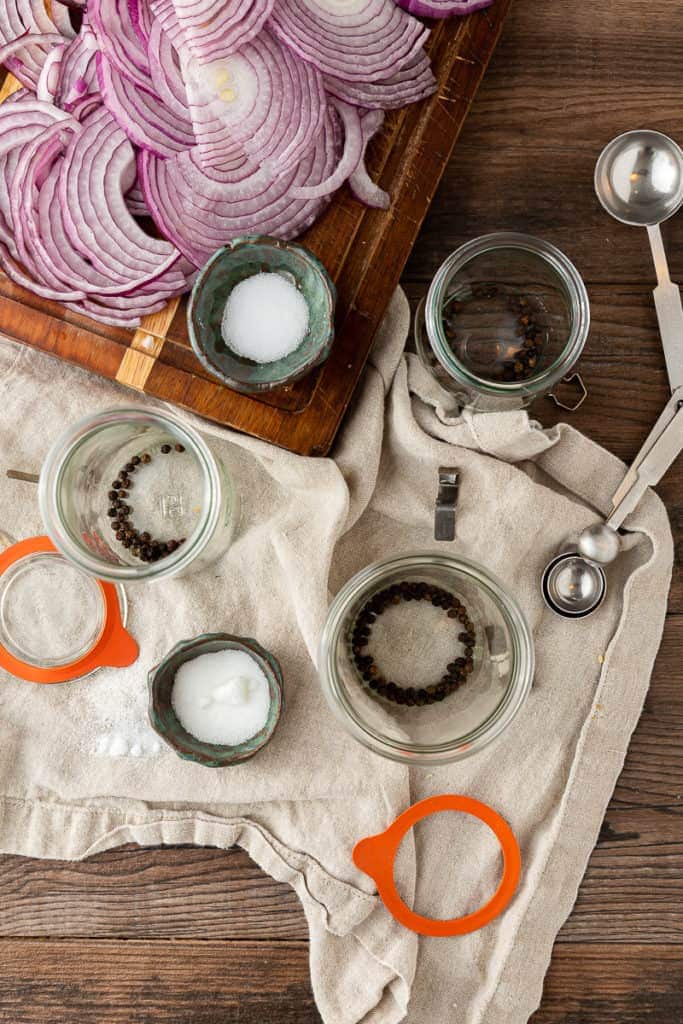 filling jars for pickled red onions