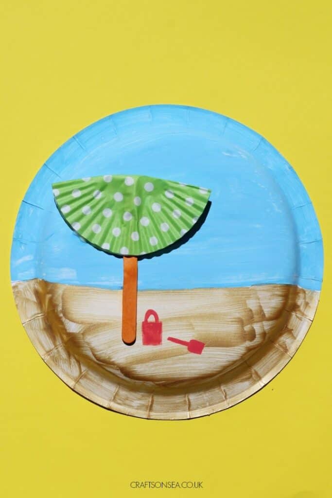 beach scene on paper plate