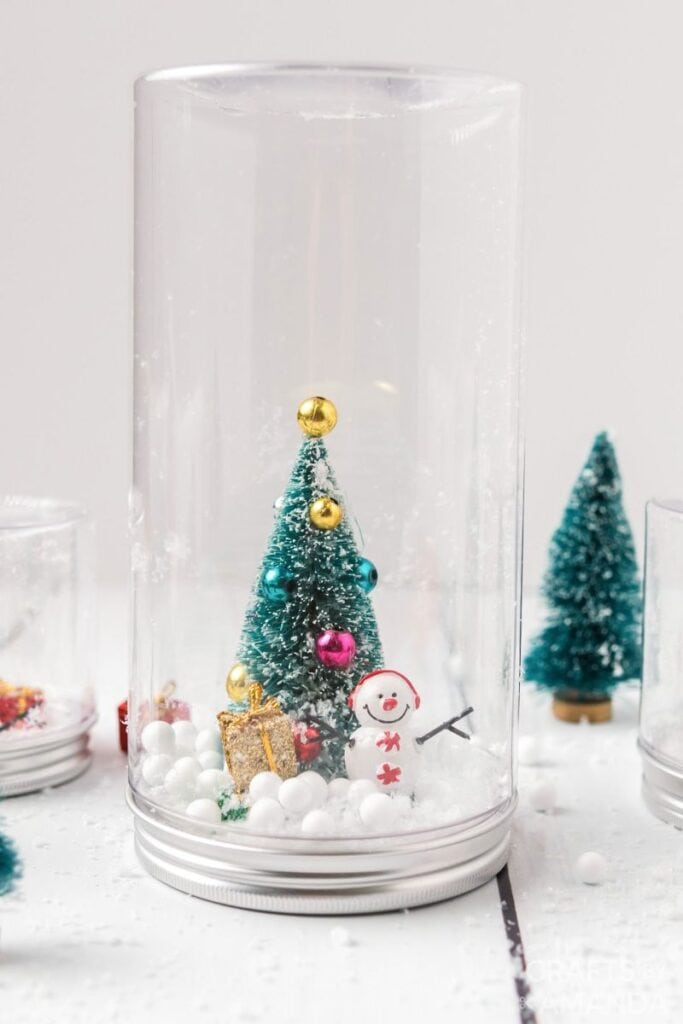 waterless snow globe with christmas tree and snowman