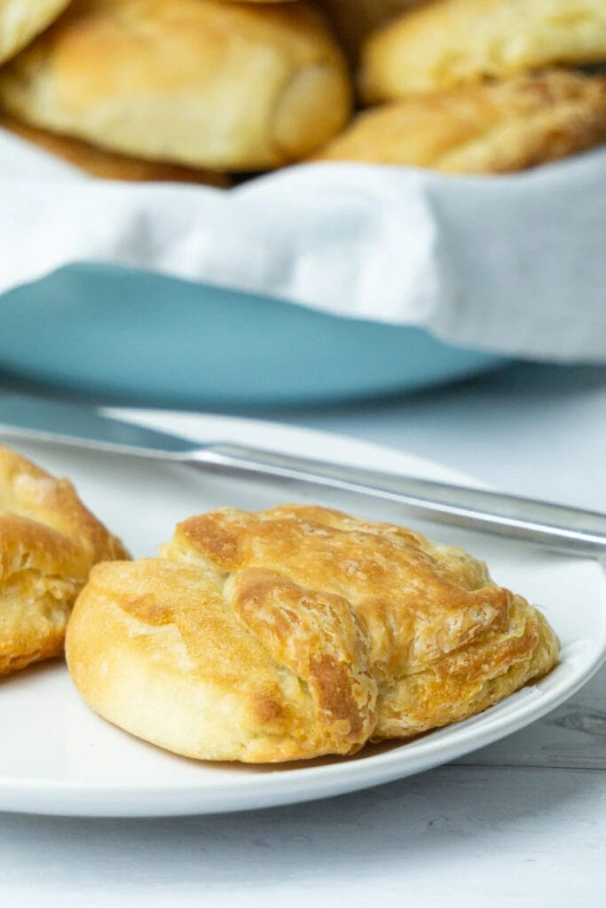 Buttery on a plate with more in the background