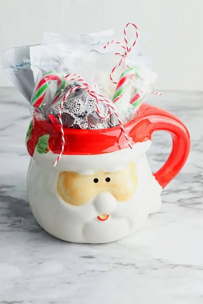 Dollar Tree Craft. Dollar Store Hot Chocolate Mug Christmas Gift is an easy last-minute homemade holiday gift idea. In a rush to fill some last minute Christmas gifts? This DIY holiday gift is so easy to create.