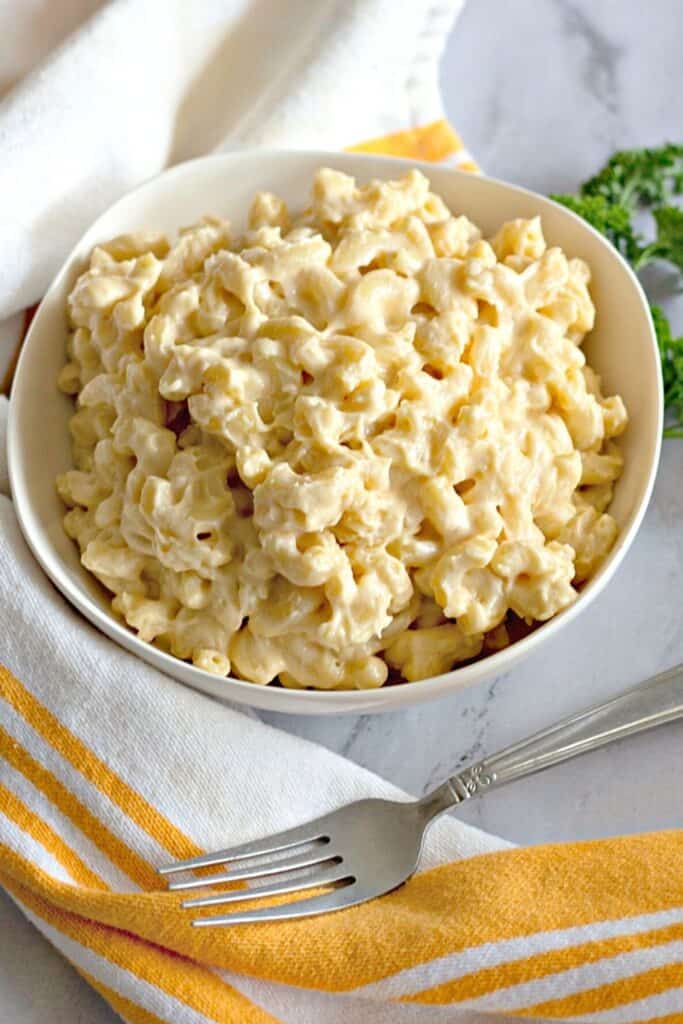 Nothing says creamy and cheesy quite like this Homemade Mac and Cheese. Talk about ultimate comfort food. The cheesy stovetop macaroni and cheese will be a new family favorite recipe.