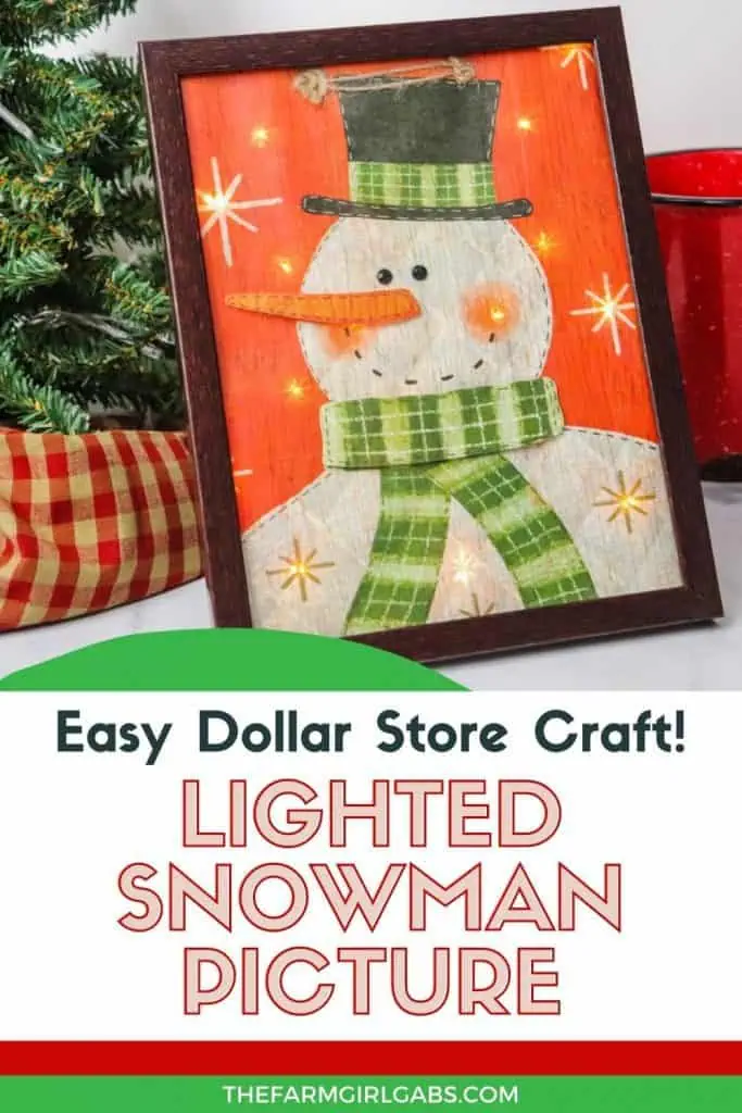 Decorate your home for the holiday season with this easy-to-make Lighted Snowman Picture. It’s fun to put together and perfect for hanging up around the home to get into the holiday spirit. This DIY Christmas craft is made with a gift bag and a dollar store frame. It is a fun dollar store Christmas craft.