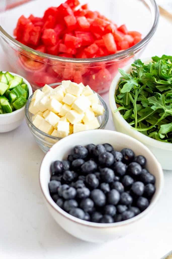 Watermelon Feta Arugula Salad is the perfect summer salad! The sweetness of the watermelon pairs perfectly with the salty feta, and the peppery arugula gives it a nice bite. If you're looking for a delicious summer salad, then this Watermelon Feta Arugula Salad is just what you've been looking for! It also makes a great patriotic recipe for your 4th of July party.