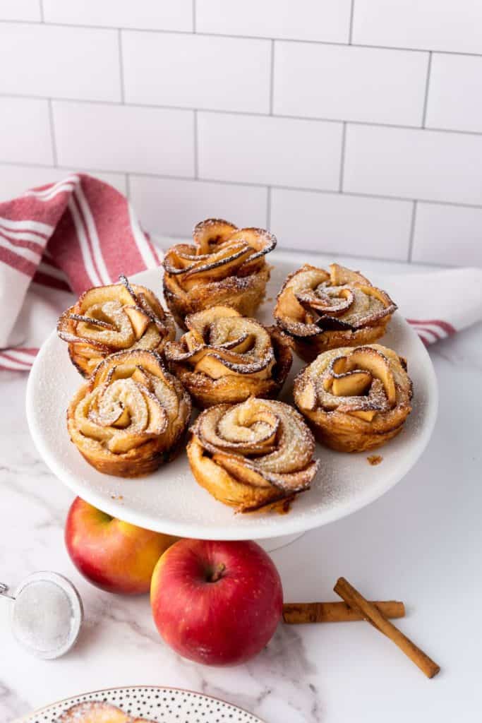 Hello, apple season! Are you looking for fun ways to get creative in the kitchen while making treats that taste as good as they look? If so, try this recipe for Puff Pastry Apple Roses. Not only are they super fun to make, but they look amazing and taste even better. This easy apple recipe is perfect for fall.