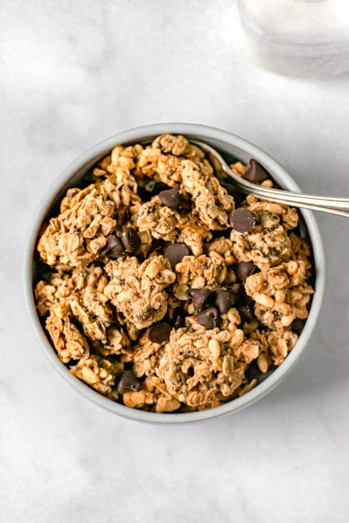 top shot of peanut butter granola with chocolate chips in a bowl