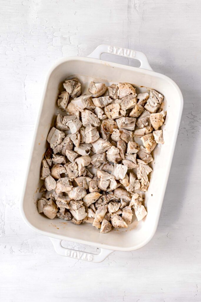 diced chicken in a casserole dish