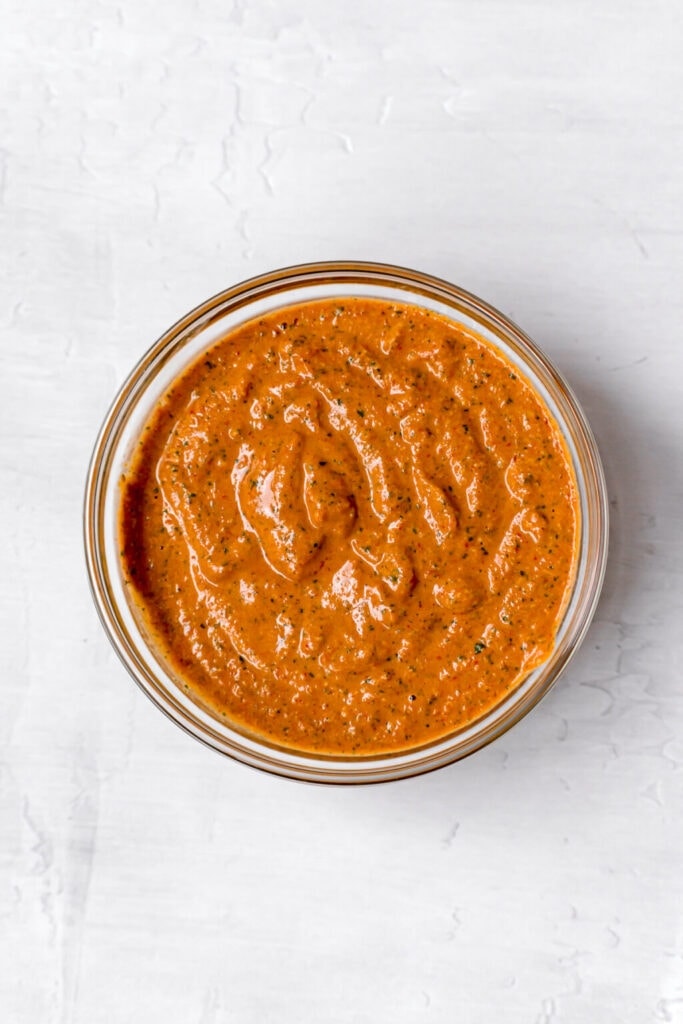 Red sauce in a bowl for dipping the pizza in. 