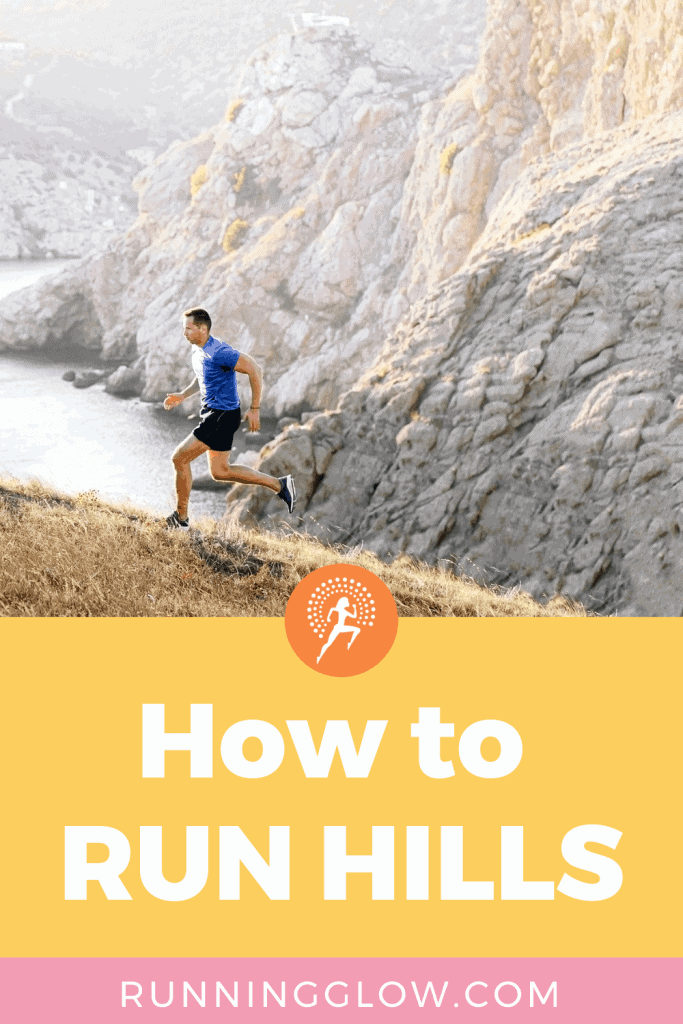 male running uphill on a mountain near the ocean