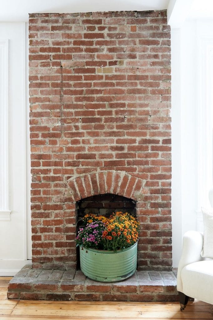 fireplace decorating ideas 57 Easy Fireplace Decorating Ideas That’ll Look Stylish All Year Long alexandra ribar faraci 7 1 1554909686 683x1024