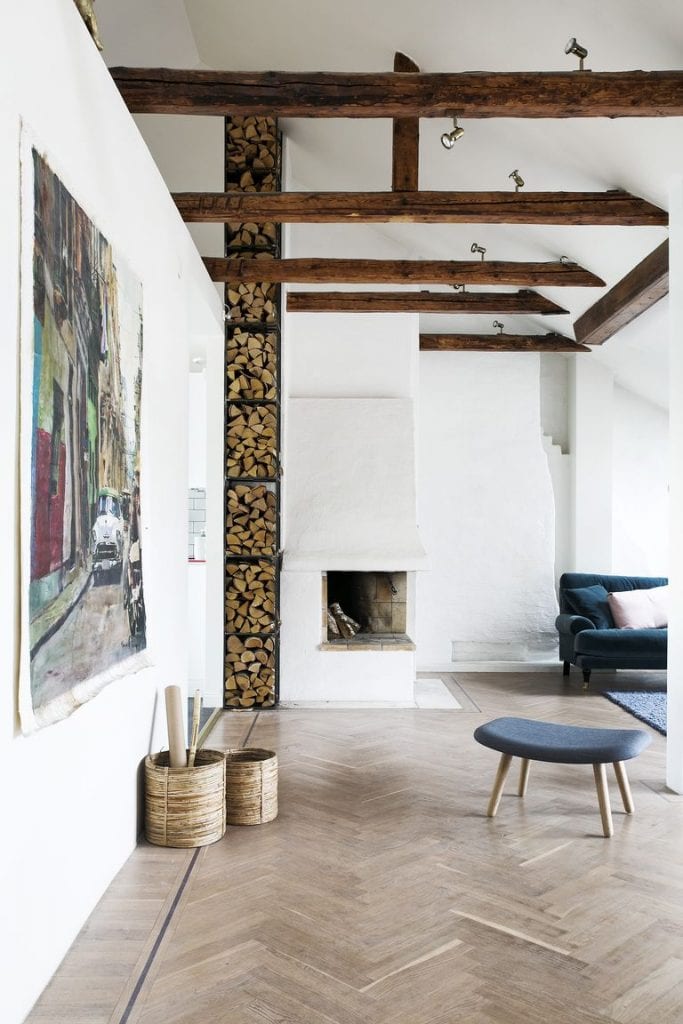 fireplace decorating ideas 57 Easy Fireplace Decorating Ideas That’ll Look Stylish All Year Long fireplace storage ideas 1556639132 683x1024