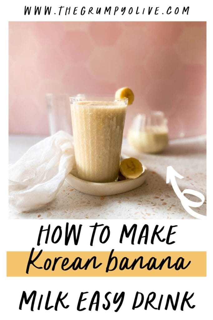 Easy Korean Banana Milk Recipe - Super Creamy 바나나 우유 8 banana milk on a marble board, a jug of milk behind and a white towel on the side - pin image