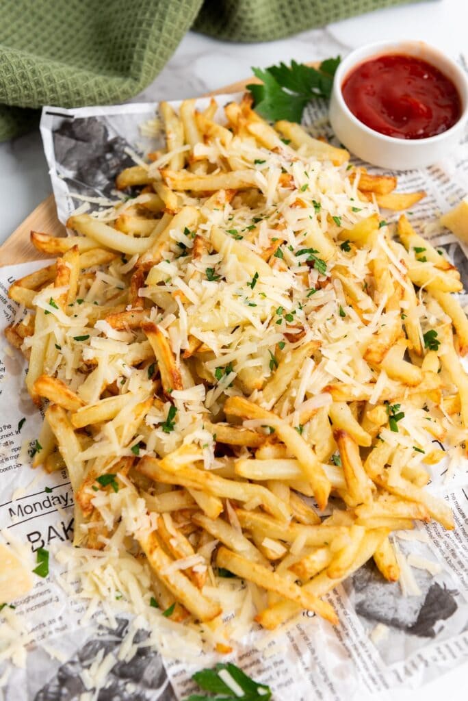 Crispy Parmesan Truffle Fries made in the air fryer. Golden, flavorful, and perfect as a snack or side dish—ready in under an hour!