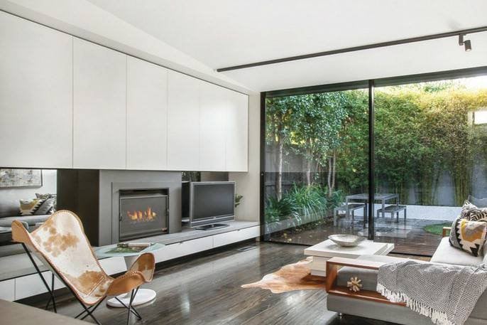A custom-made entertainment unit. Made for a customer in Turramurra on the North Shore of Sydney. With a fire Place and overhead storage.