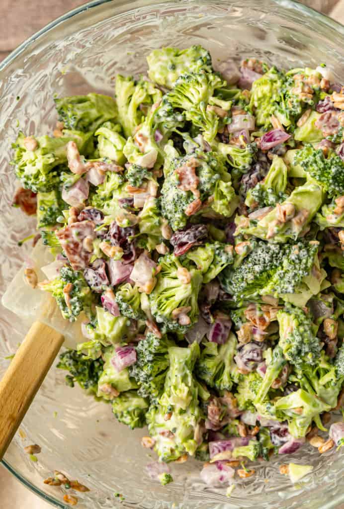 Mixing up broccoli crunch salad like from Whole Foods