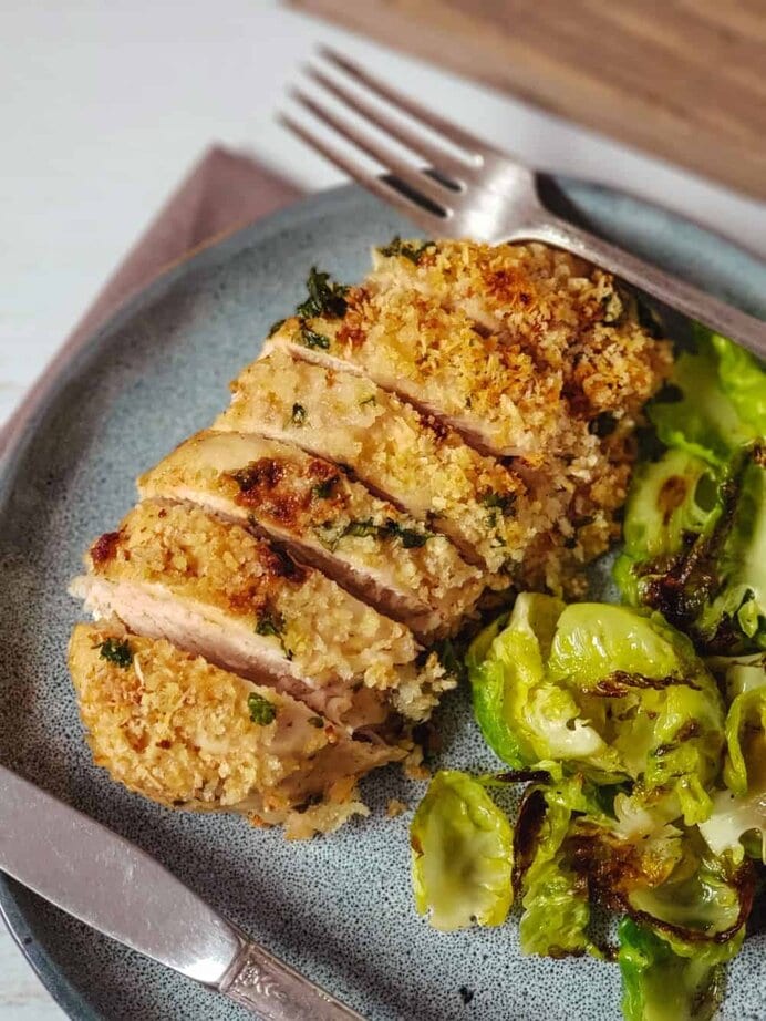 Tired of the same old chicken recipe for dinner? Mix things up with this easy and delicious Parmesan Dijon Chicken recipe for weeknight dinner. #chickenrecipe #easyrecipe #chickendinner #parmesanchicken