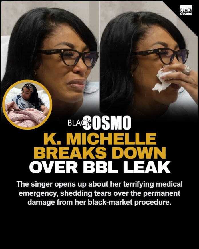 K. Michelle looking emotional and speaking candidly during a television appearance about her health struggles and surgery complications.