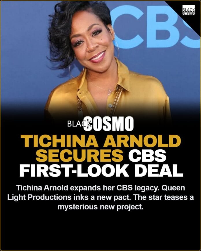Tichina Arnold smiling on the red carpet, representing her new first-look deal with CBS Studios