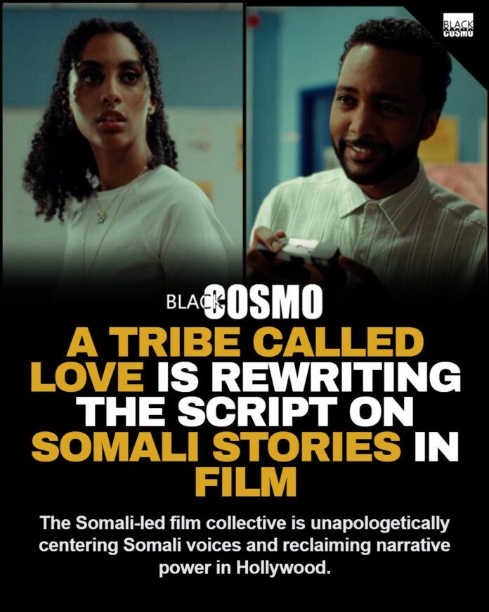 A group of Somali filmmakers from the collective 'A Tribe Called Love' standing together, with a cityscape in the background.