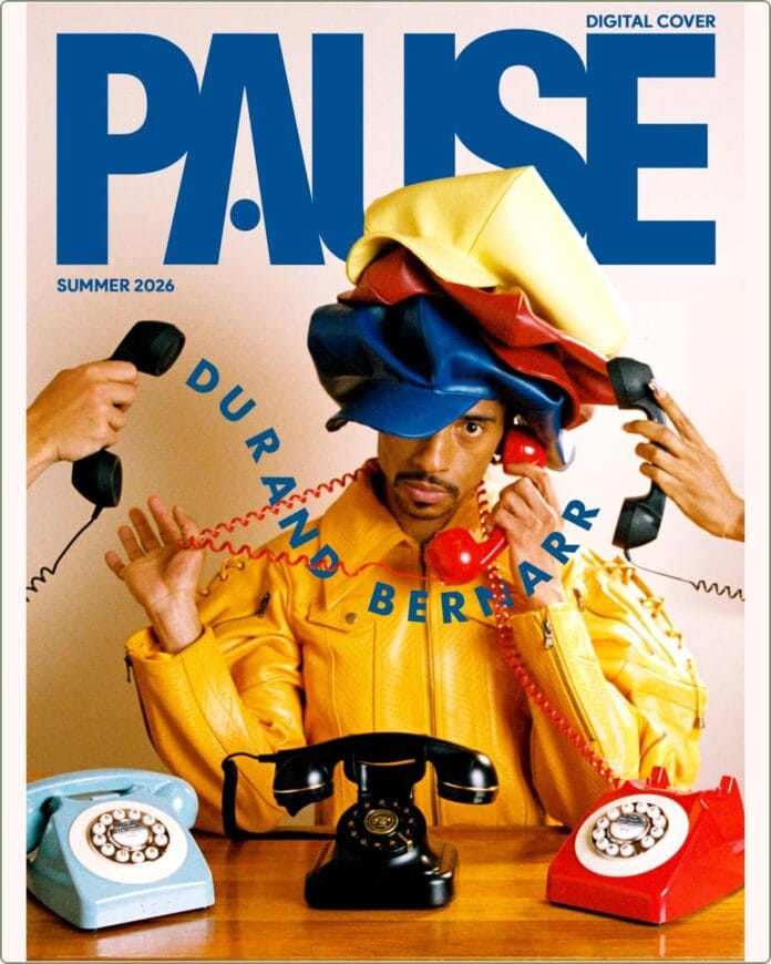 Durand Bernarr posing in a muted lichen green setting with cellular beadwork accessories and textured plumage garments for PAUSE Online June 2026 cover.