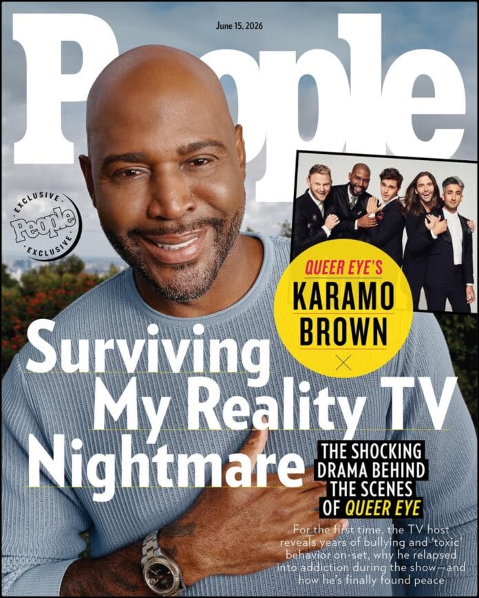 Karamo Brown posing for a portrait against a neutral background.