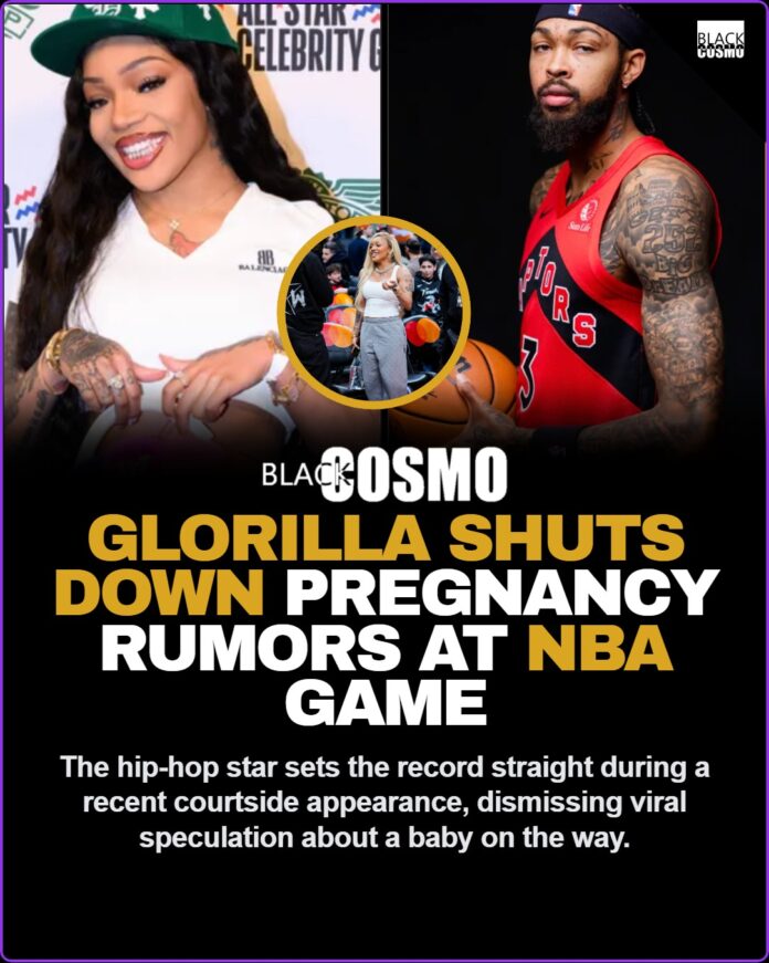 GloRilla sitting courtside at an NBA basketball game.