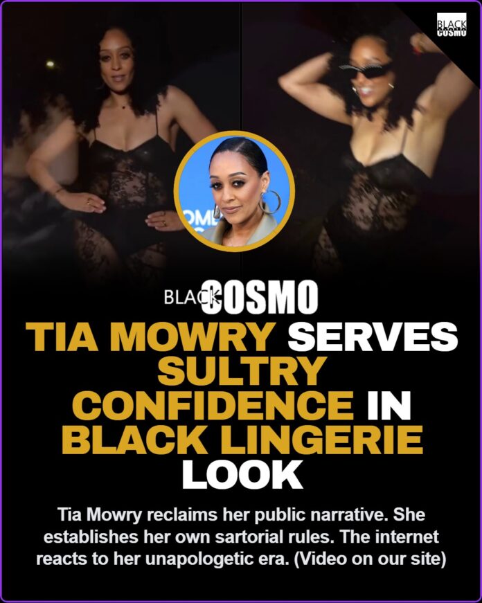 Tia Mowry posing confidently, representing her viral black lingerie style moment.