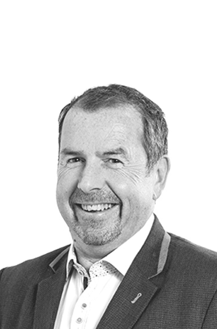 Chief Executive Officer Martin Wiggins Smiling